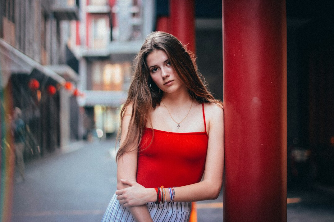 Portrait of a young Chilean woman on a city street