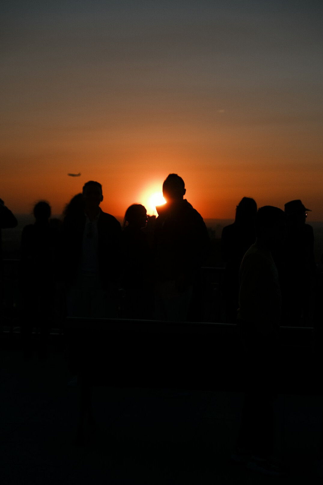 city sunset with people